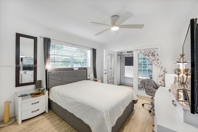 1 Keswick A 1, Deerfield Beach, FL 33442 - bedroom featuring multiple windows, light wood-type flooring, french doors, and ceiling fan
