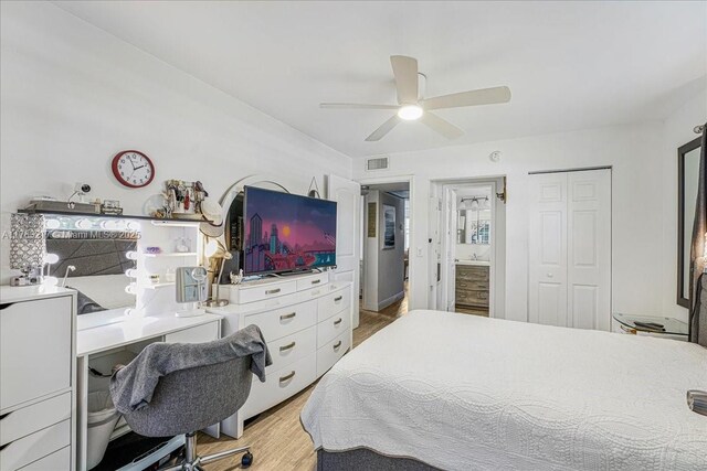 1 Keswick A 1, Deerfield Beach, FL 33442 - bedroom featuring light wood-type flooring, a closet, ceiling fan, an office area, and connected bathroom