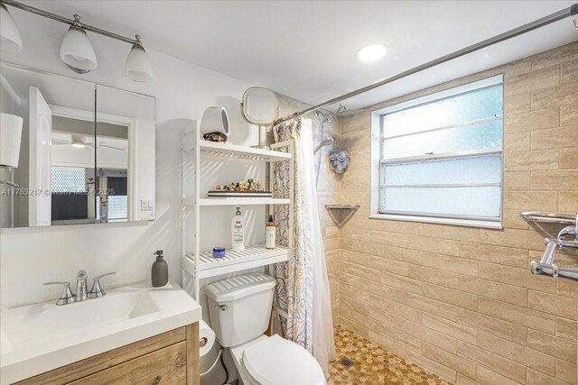 1 Keswick A 1, Deerfield Beach, FL 33442 - full bathroom with toilet, vanity, and a tile shower