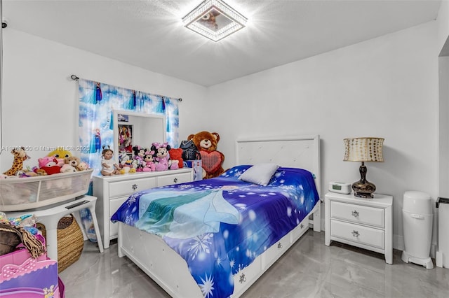 bedroom with marble finish floor