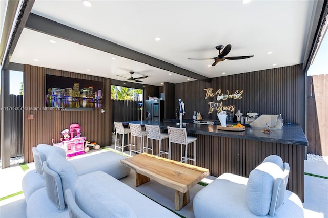 living area with recessed lighting and ceiling fan
