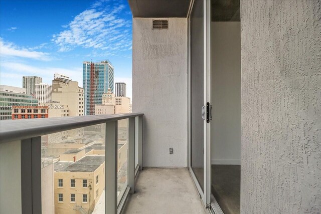 151 SE 1st St Unit 1011, Miami, FL 33131 - balcony with a skyline view
