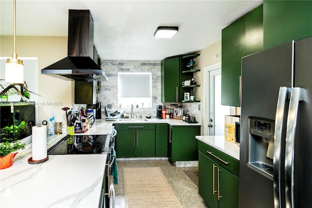 kitchen featuring electric range, island exhaust hood, a sink, stainless steel refrigerator with ice dispenser, and green cabinets