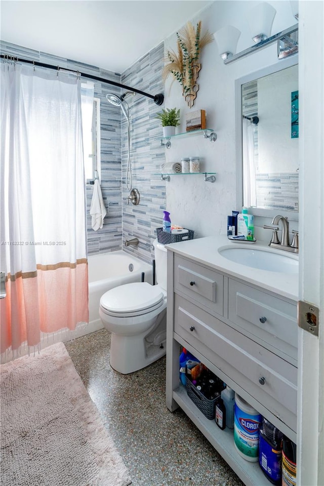 full bath with shower / bath combo with shower curtain, toilet, and vanity