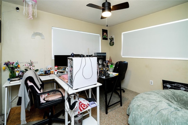 carpeted bedroom with ceiling fan