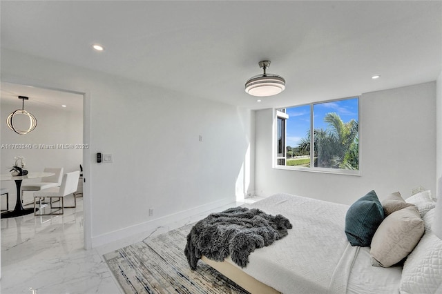 bedroom featuring recessed lighting, marble finish floor, and baseboards