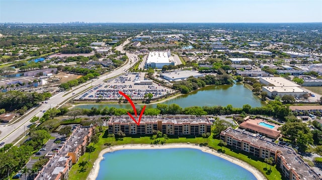 drone / aerial view featuring a water view