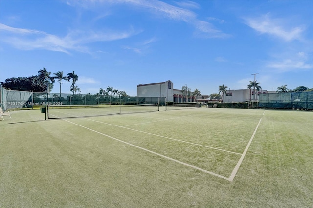 view of sport court with fence