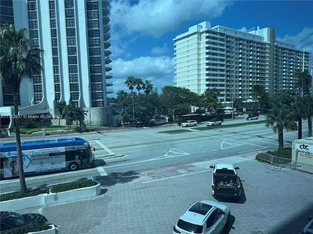 view of street featuring curbs and sidewalks