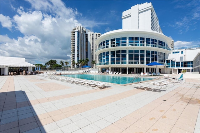 community pool with a patio