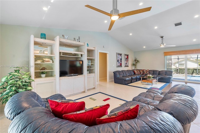 living area with tile patterned flooring, vaulted ceiling, a ceiling fan, and visible vents