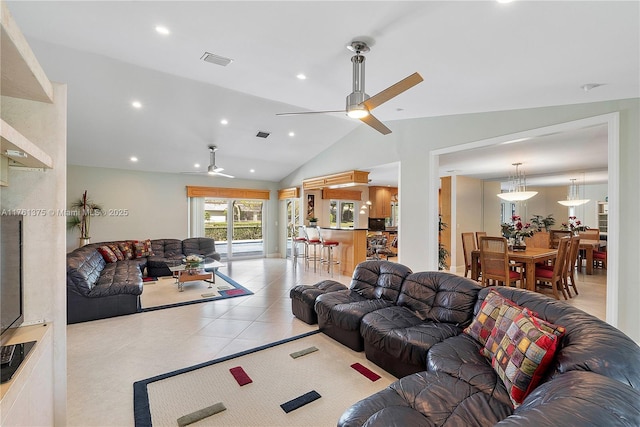 living area with a ceiling fan, visible vents, recessed lighting, vaulted ceiling, and tile patterned floors