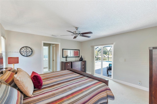 carpeted bedroom with baseboards, a textured ceiling, a ceiling fan, and access to outside