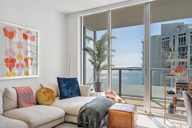 sitting room featuring a wall of windows