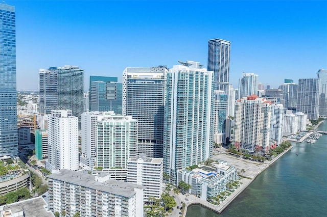 bird's eye view with a view of city and a water view