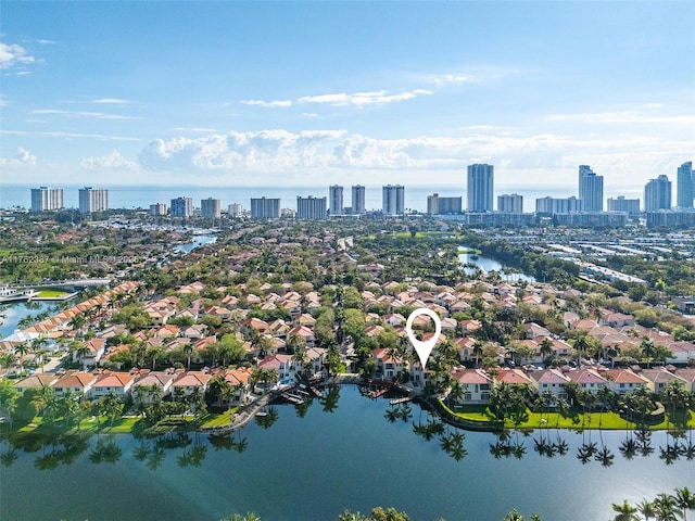 aerial view with a view of city and a water view