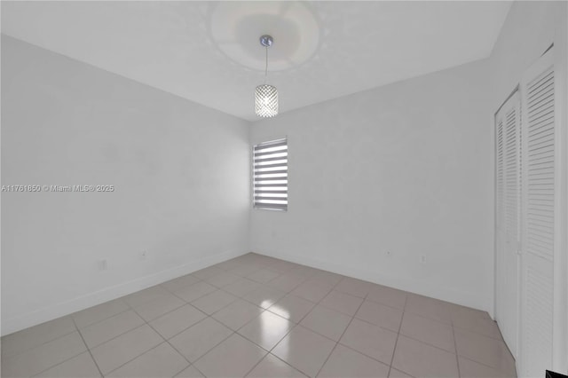15712 SW 90th Ter, Miami, FL 33196 - spare room with light tile patterned floors and baseboards