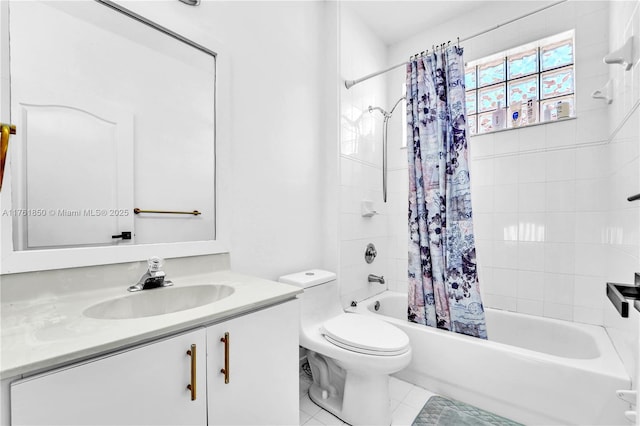 full bathroom featuring tile patterned floors, toilet, vanity, and shower / tub combo with curtain