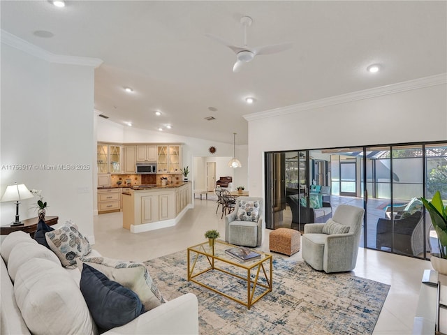 living room featuring light tile patterned floors, a ceiling fan, recessed lighting, ornamental molding, and vaulted ceiling