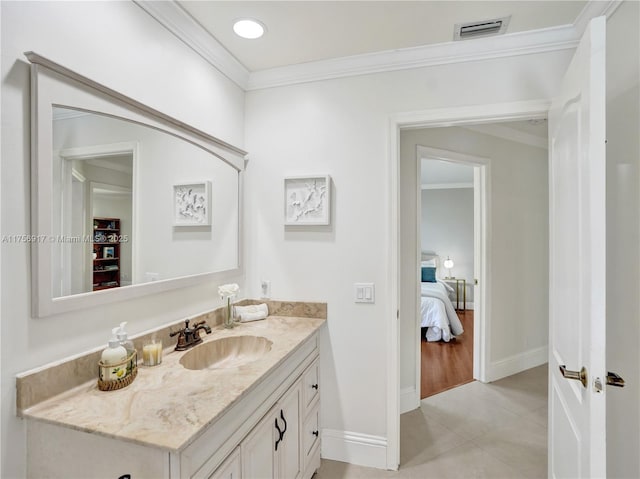 ensuite bathroom featuring tile patterned floors, visible vents, ensuite bath, crown molding, and vanity