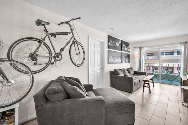 living area with a textured ceiling