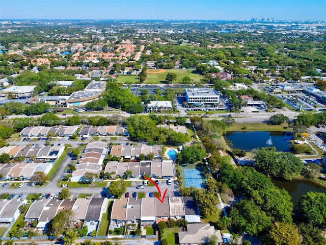 aerial view with a water view and a residential view