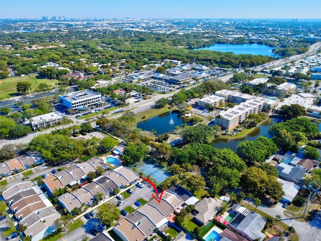 birds eye view of property featuring a water view