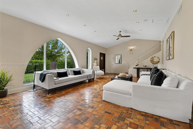 living room featuring visible vents, recessed lighting, baseboards, lofted ceiling, and ceiling fan