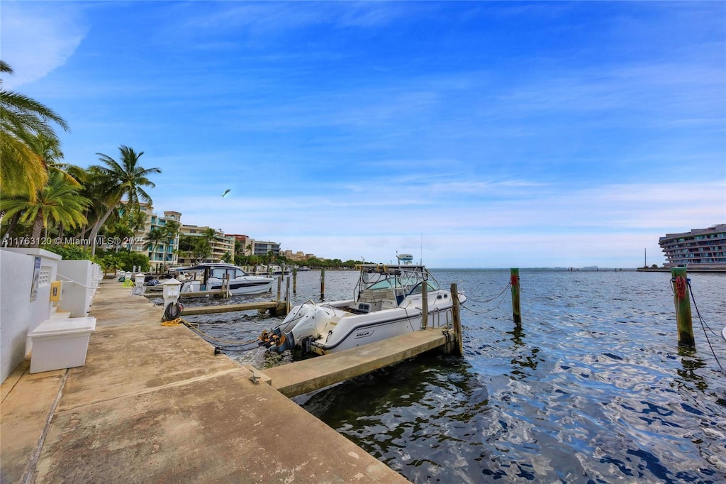 dock area featuring a water view