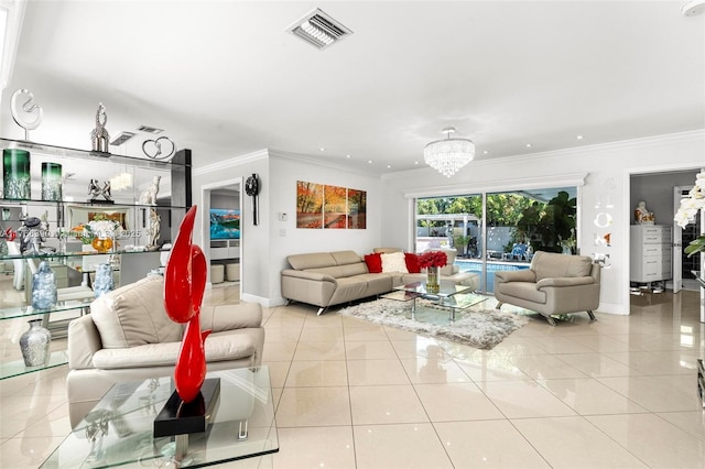 tiled living room with visible vents, baseboards, a chandelier, and ornamental molding