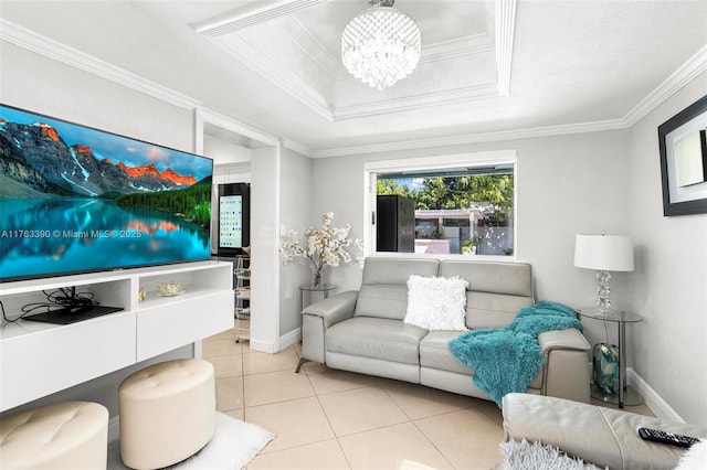 living area featuring a tray ceiling, a notable chandelier, light tile patterned flooring, and crown molding