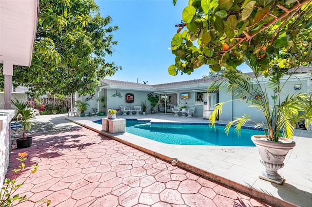 view of pool with a patio area and a fenced in pool