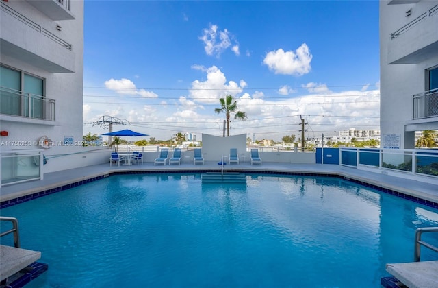 pool with a patio