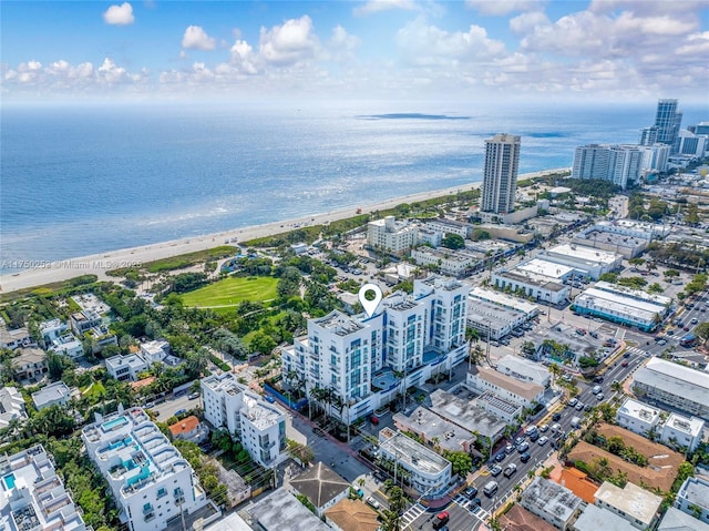 aerial view with a city view and a water view