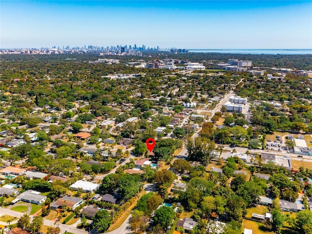 birds eye view of property with a city view