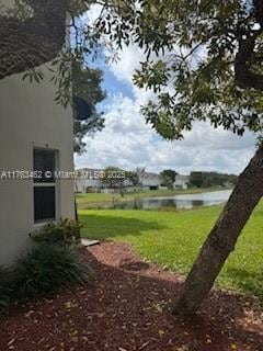 view of yard with a water view