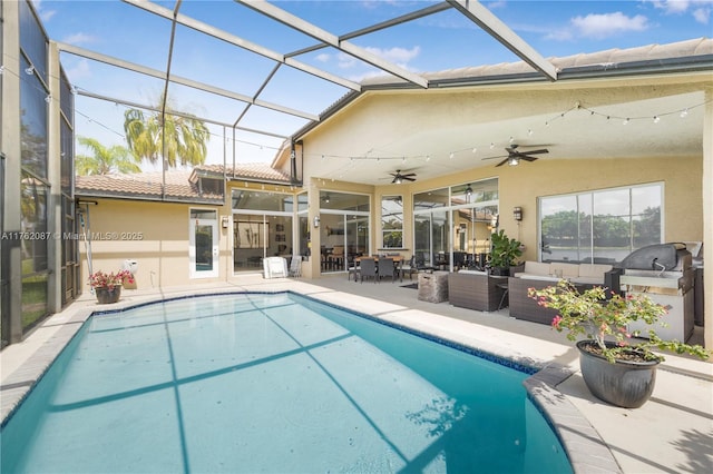 outdoor pool featuring outdoor dining space, a patio, glass enclosure, an outdoor hangout area, and ceiling fan