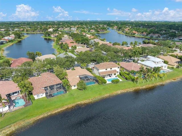 aerial view featuring a water view and a residential view