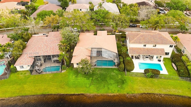 aerial view featuring a water view and a residential view