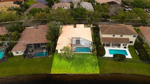 birds eye view of property with a residential view