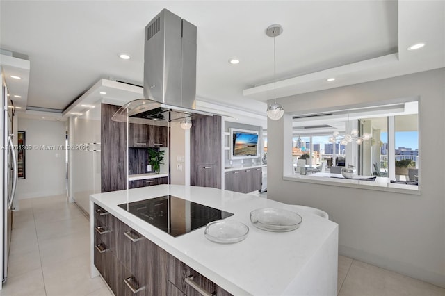 kitchen featuring light tile patterned floors, recessed lighting, island range hood, modern cabinets, and black electric cooktop