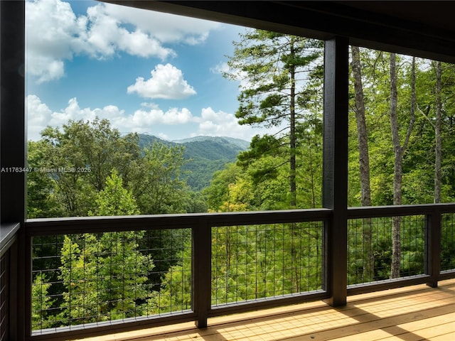 view of mountain feature featuring a wooded view