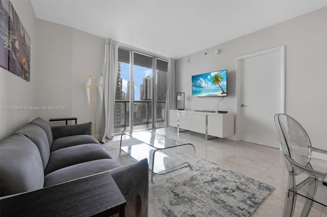 living room featuring a wall of windows