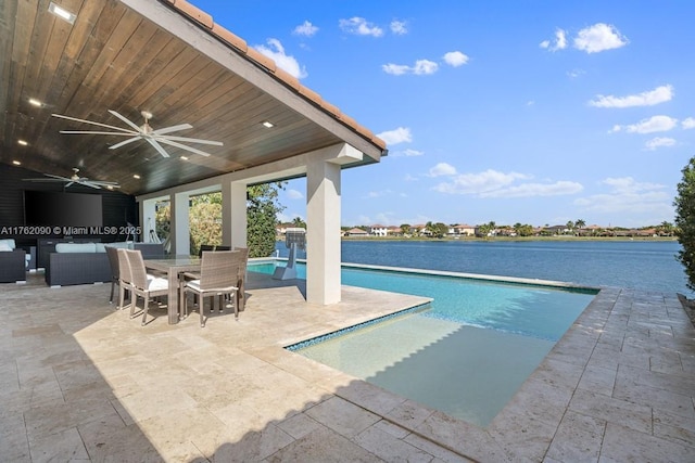 outdoor pool featuring outdoor dining space, a patio, a water view, and outdoor lounge area