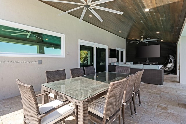 view of patio featuring outdoor dining space, ceiling fan, and an outdoor hangout area