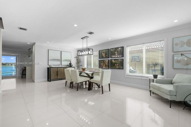 dining room with visible vents, baseboards, ornamental molding, light tile patterned floors, and recessed lighting