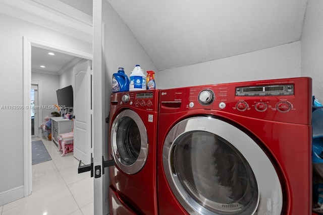 clothes washing area featuring ornamental molding, washer and clothes dryer, recessed lighting, tile patterned flooring, and laundry area