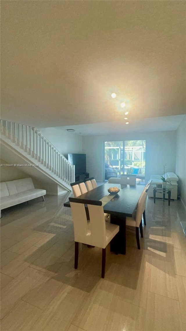 dining area with stairs