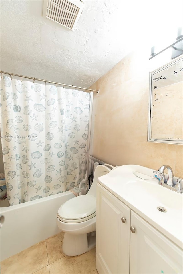 bathroom with tile patterned flooring, visible vents, toilet, shower / tub combo, and a textured ceiling