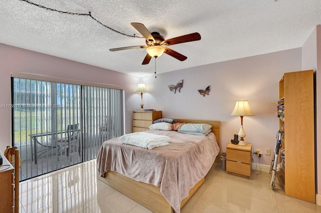 bedroom with light tile patterned floors, a ceiling fan, baseboards, access to exterior, and a textured ceiling